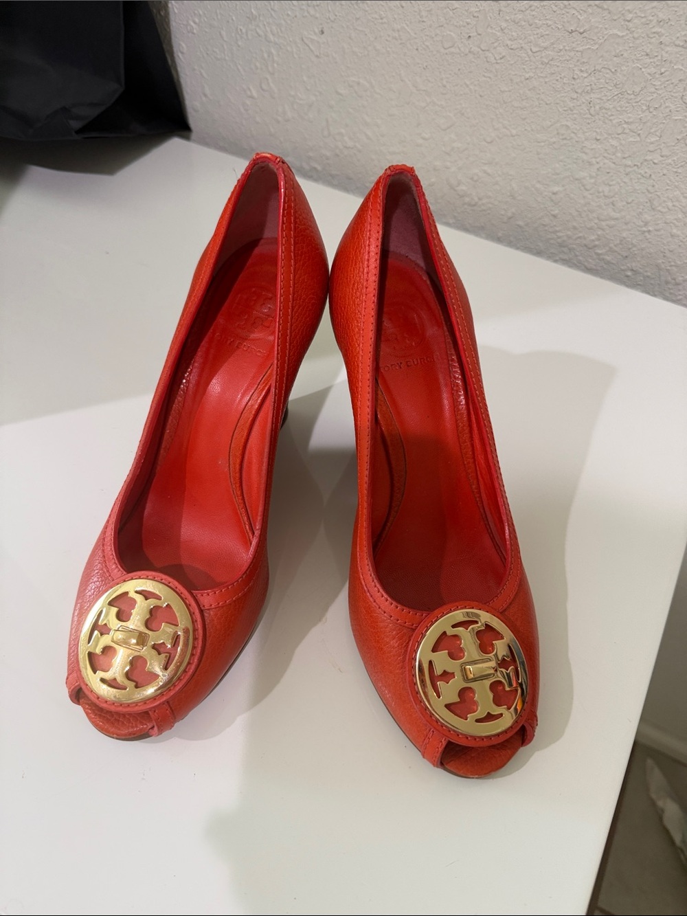 Tory Burch Red Leather Peep-Toe Pumps with Gold Logo Medallion